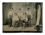 Tintype: Portrait of five men in studio with backdrop. by Warriner and Bakers